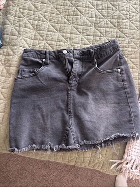 Washed Black Denim Mini Skirt with Frayed Hem